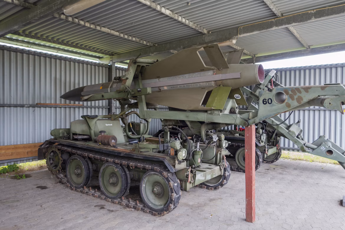 Military vehicle inside a garage